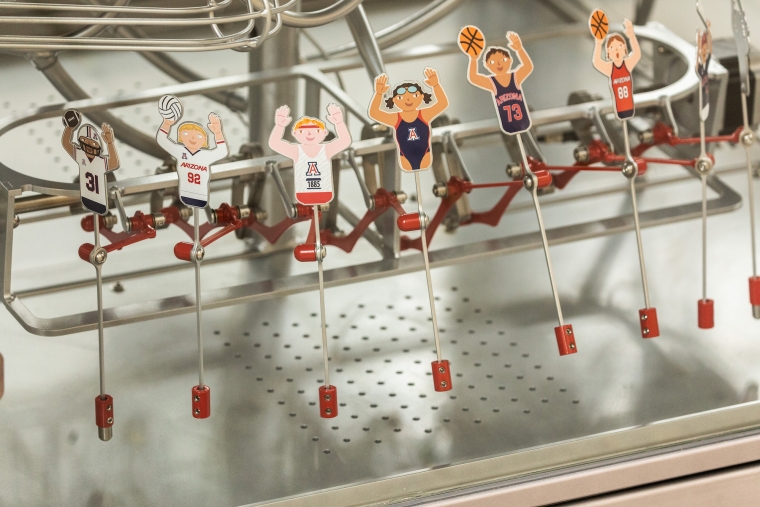 Miniature cut-outs of Wildcat athletes are part of the display