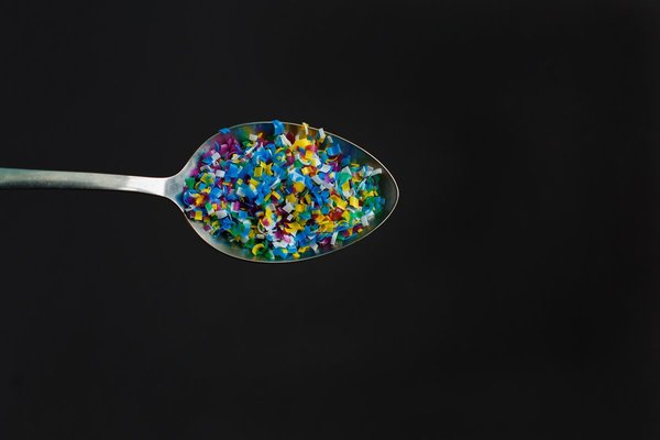 Photograph of microplastic particles in a spoon