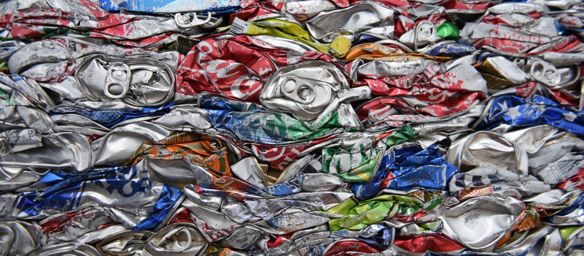 Aluminum cans crushed into a block