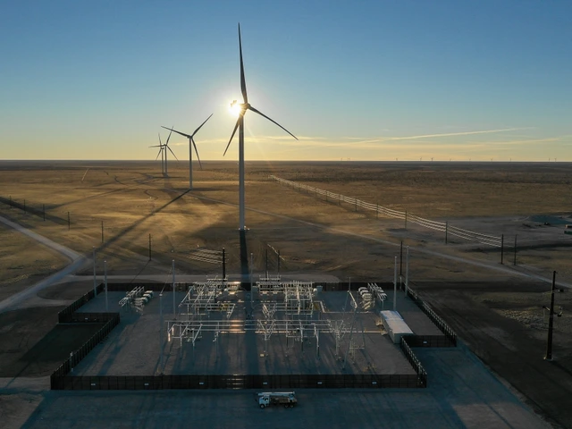 Wind turbine with sun behind the center of the turbine