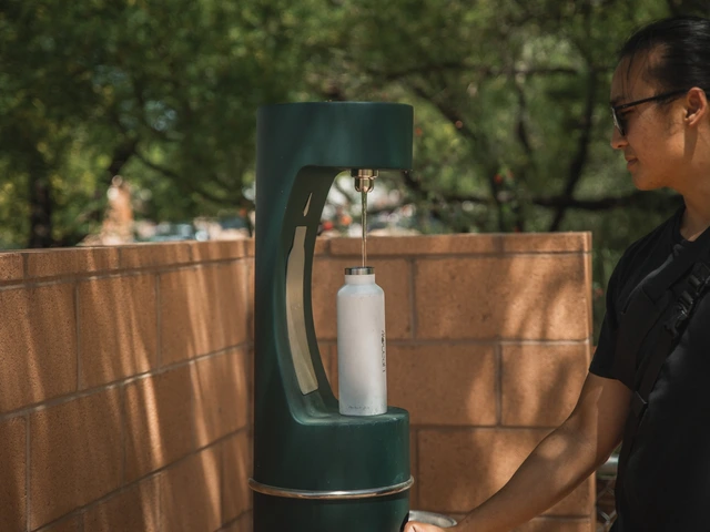 boy filling his bottle at the bottle filling station