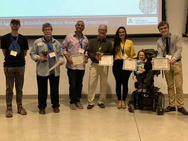 Symposium awardees are presented with awards. 