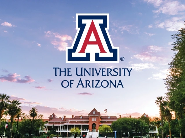 Old Main at sunset with the University of Arizona logo in the sky above the building