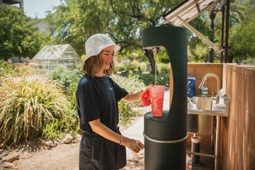 Individual refills bottle at the new sink. 