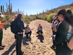 Group of students talking in Saguharo National park.