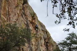 A person rock climbing.