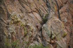 A person rock climbing.