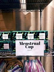A bin of menstrual cups labeled "small".