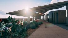 Computer render of solar panels and a green roof on the top of the ENR2 Building on campus. 