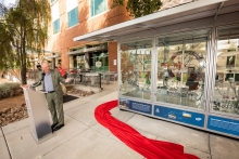 University of Arizona President Robert C. Robbins speaks during the unveiling of the display, on the south side of the Student Union Memorial Center.